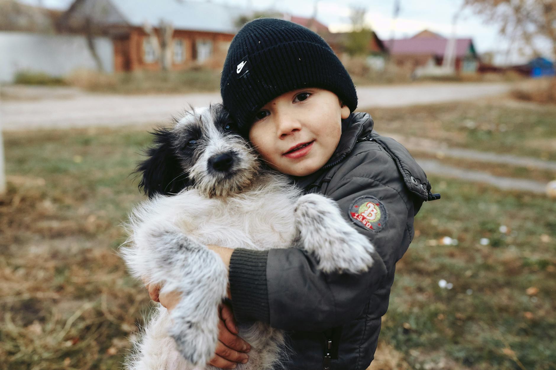 portrait of boy with dog